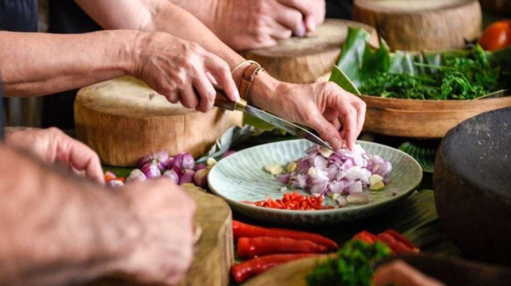 tourists cooking swahili foods